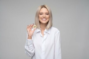 How to explain crypto woman holding bitcoin for decentral publishing