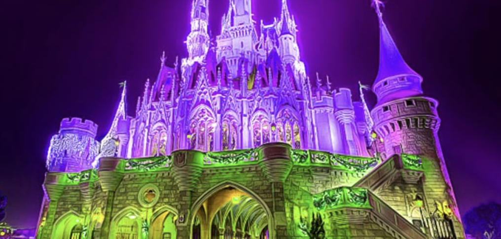 crypto news wrap up castle in purple and green lights for decentral publishing