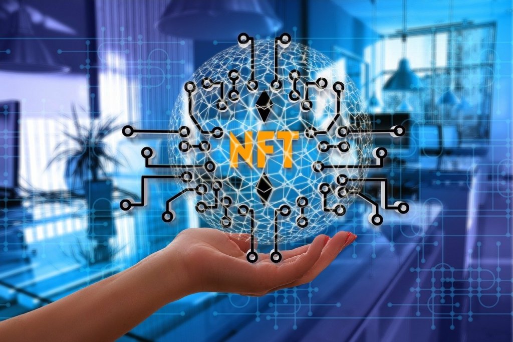 protecting IP in NFTs legal industry hand globeprotecting IP in NFTs legal industry hand globe