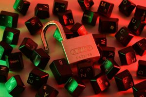 secure crypto investments lock on top of keyboard keys on a red background for decentral publishing