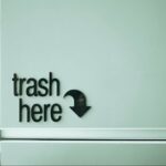 trash here sign on wall
