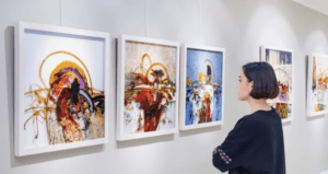 uncensored crypto woman looking at art on a wall for decentral publishing